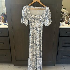 Smith and Quinn Lucy Dress. Square neck and puff sleeves.